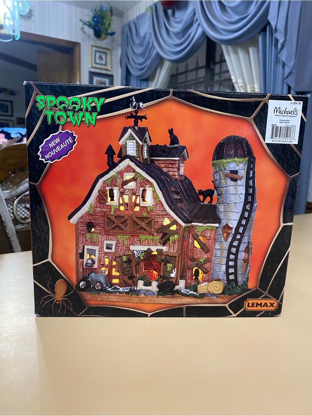 Lemax Spooky Town Haunted Barn in Orange and Black with Gray Silo